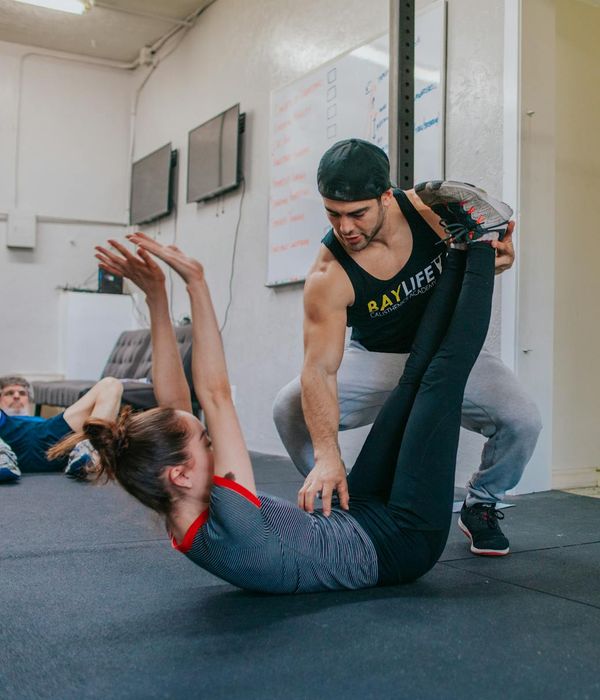 Person stretching gently indoors, showing improved flexibility and calmness.